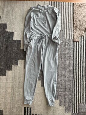 Under Armour Women's Light Gray Track Jumpsuit with Half-Zip